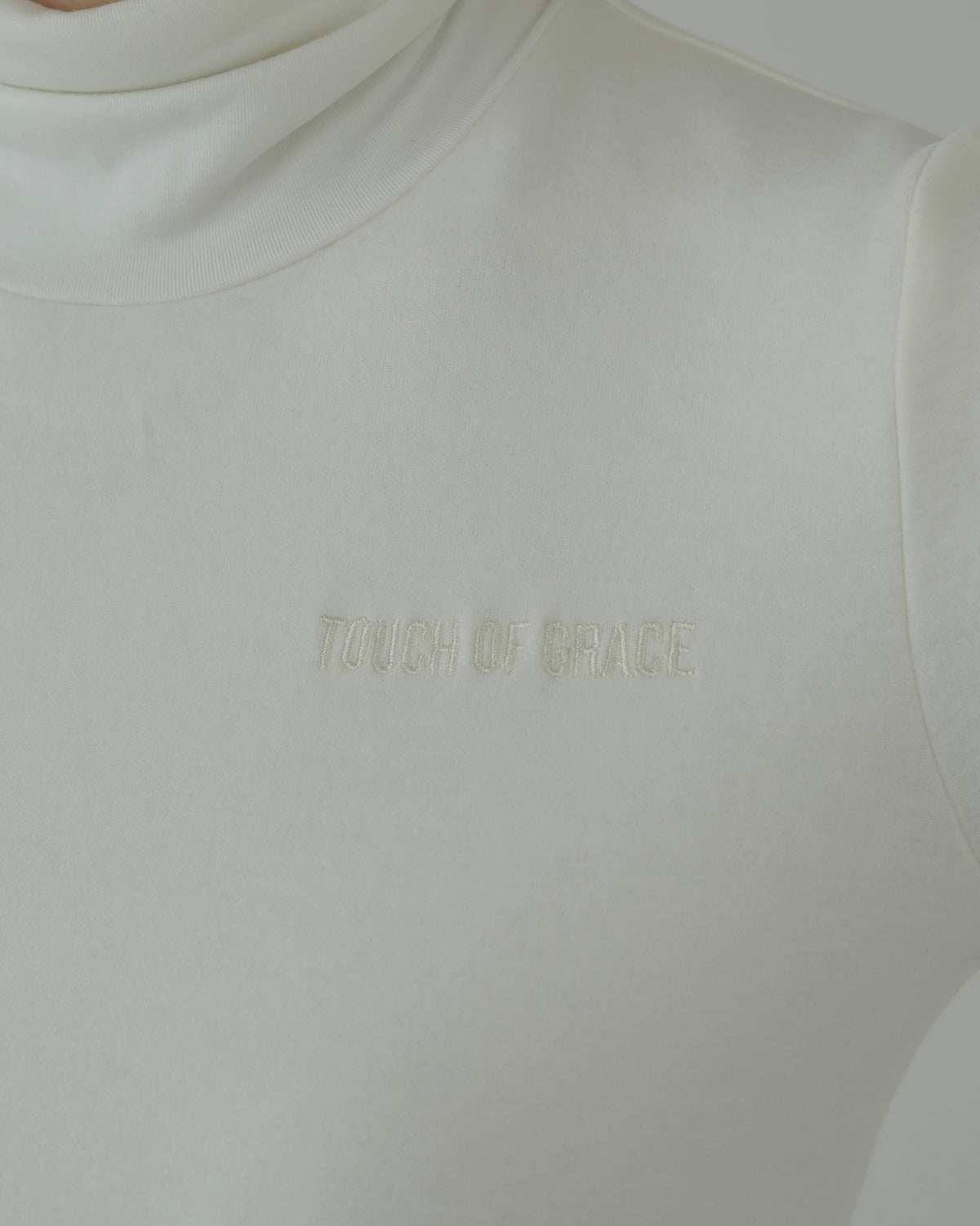 Lueur Turtleneck
 (WHITE)